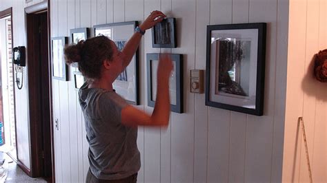 How To Hang Pictures Without Putting Holes In The Wall